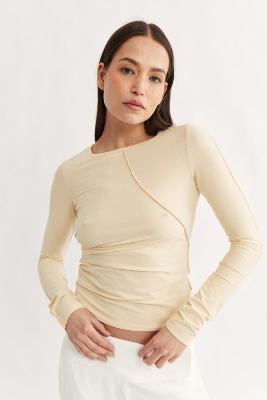 Womens yellow long sleeve seam detail top