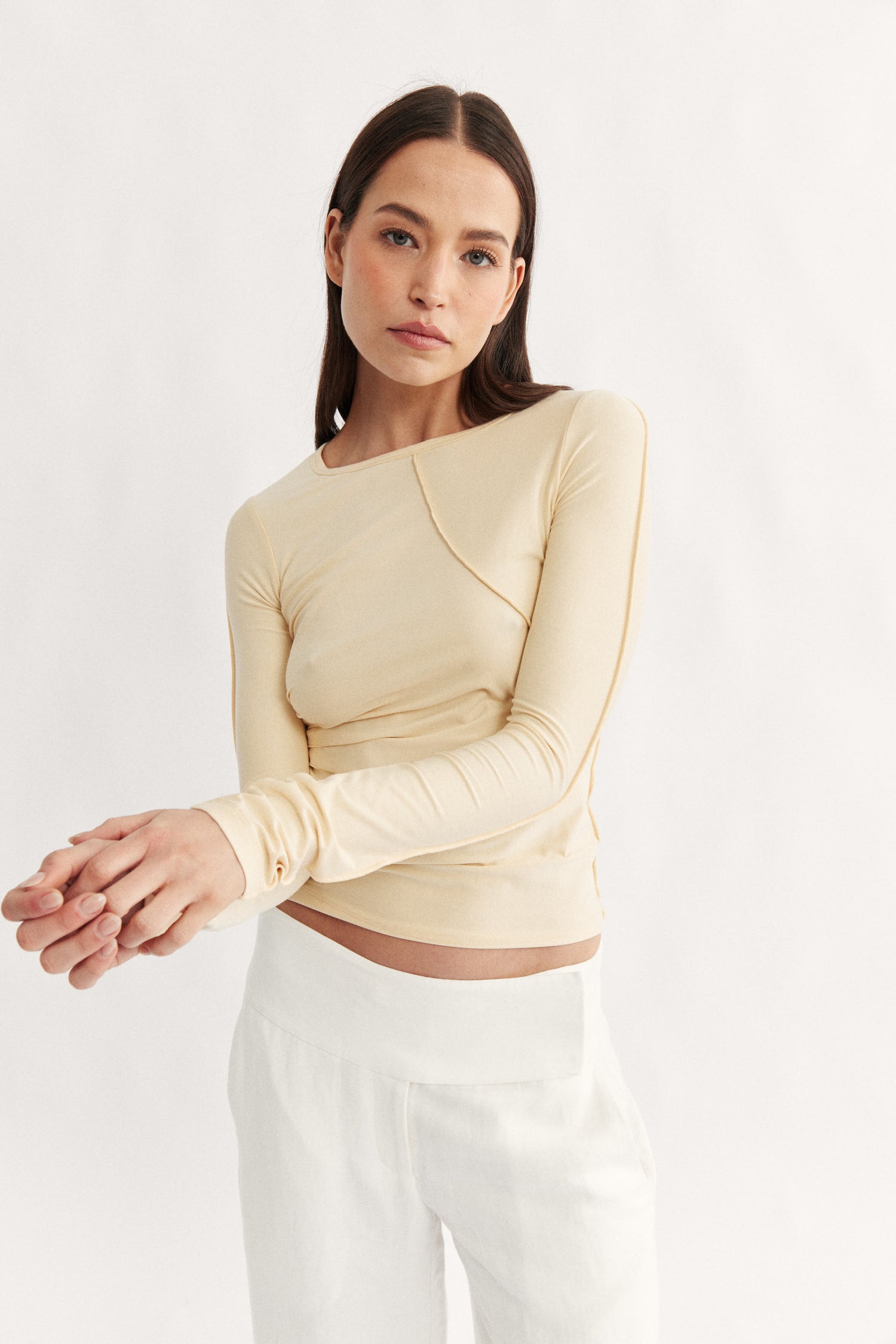 Womens yellow long sleeve seam detail top