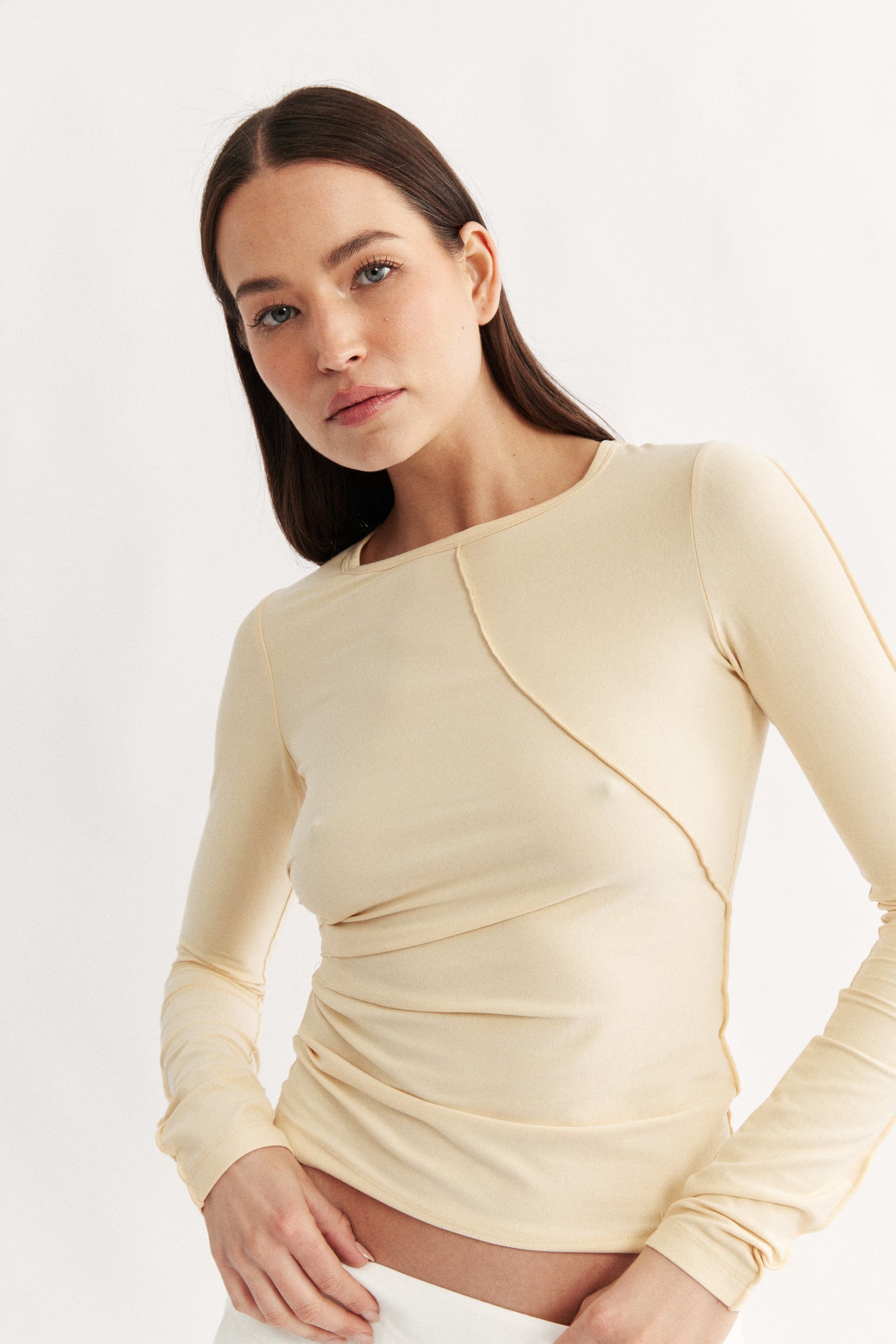 Womens yellow long sleeve seam detail top